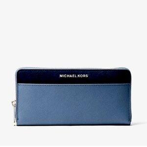Michael Kors Jet Set Continental wallet 
Blue/ navy saffiano leather